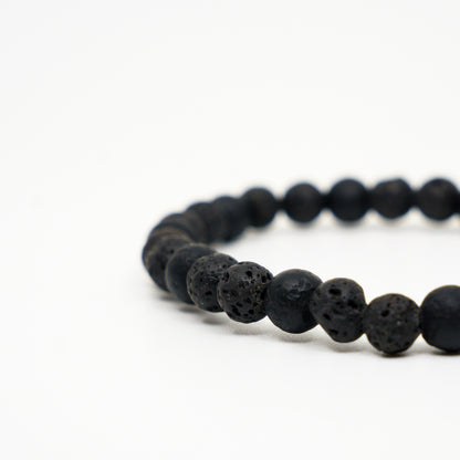 Noir beads stacked with a raven band.