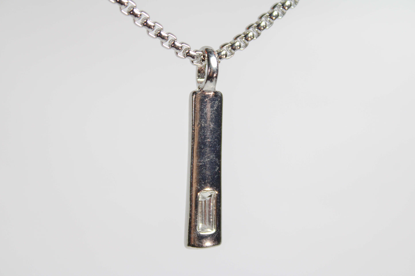 Baguette Bar layered Cuban chain necklace.