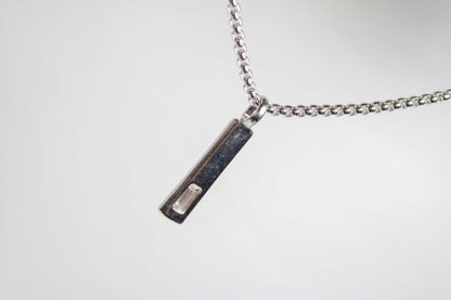 Baguette Bar layered Cuban chain necklace.