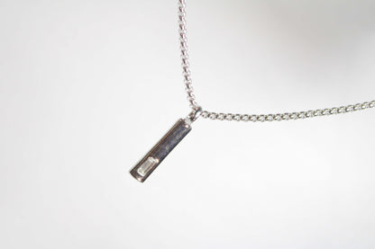 Baguette Bar layered Cuban chain necklace.