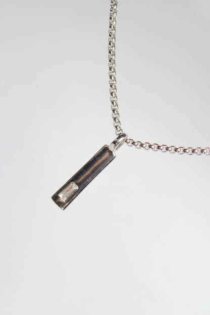 Baguette Bar layered Cuban chain necklace.