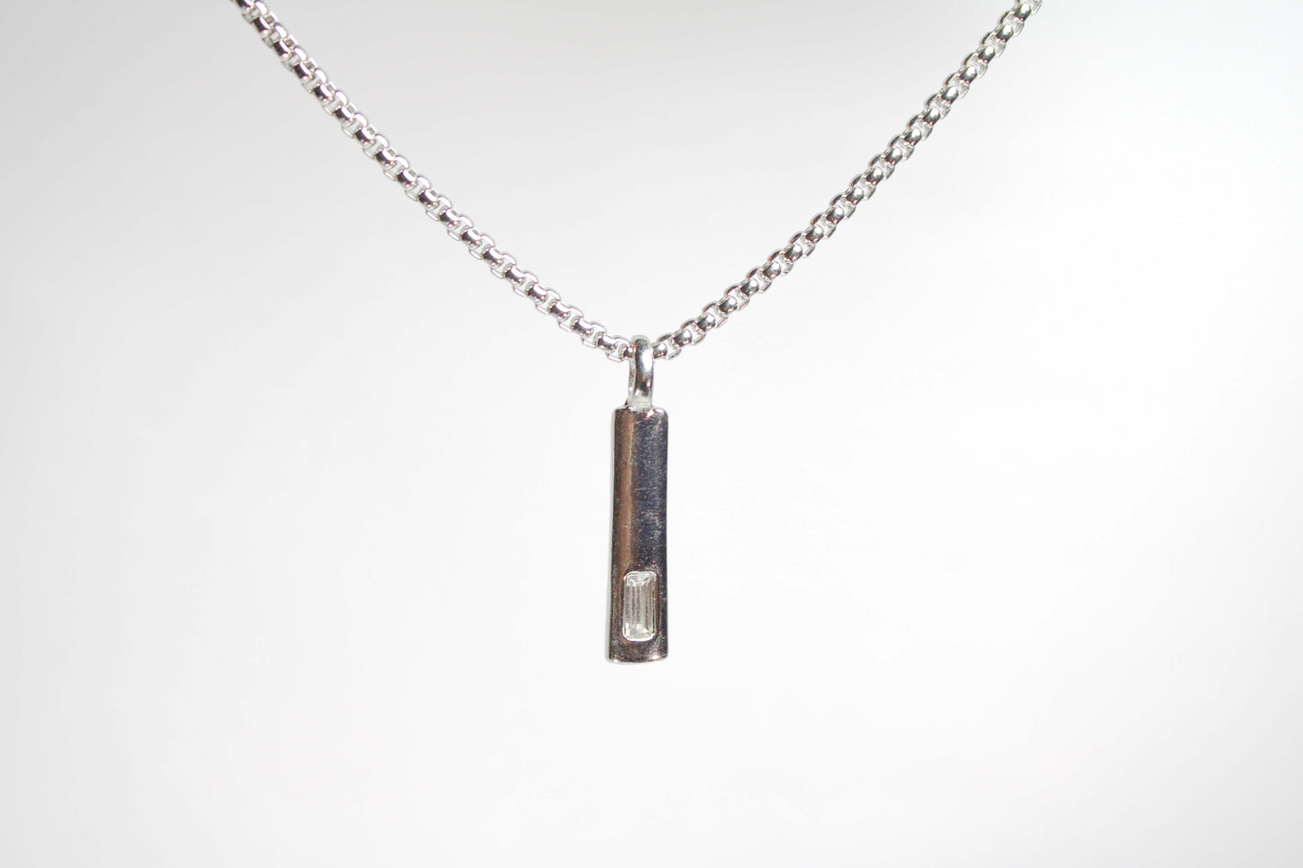 Baguette Bar layered Cuban chain necklace.