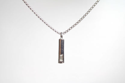 Baguette Bar layered Cuban chain necklace.