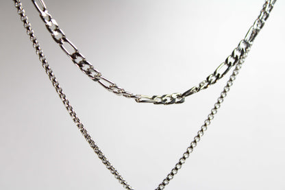 Baguette Bar layered Cuban chain necklace.