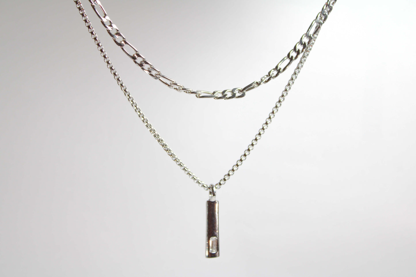 Baguette Bar layered Cuban chain necklace.