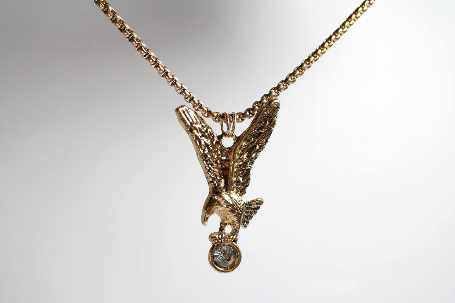 Gold eagle necklace