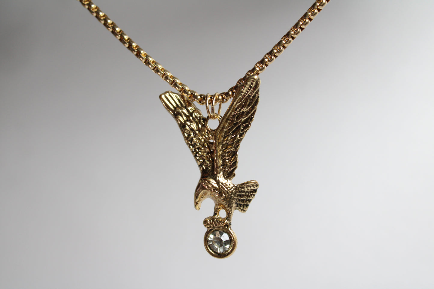 Gold eagle necklace